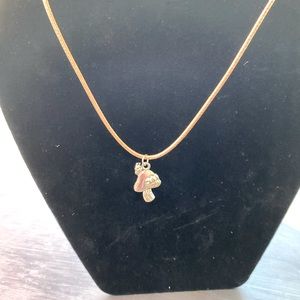 Cute silver mushroom pendant with caterpillar on a rope style necklace w/clasp.